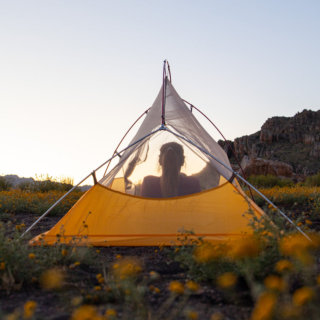 Engineered for optimal airflow with one door and three mesh windows, ensuring the tent remains cool and comfortable by facilitating continuous air circulation.