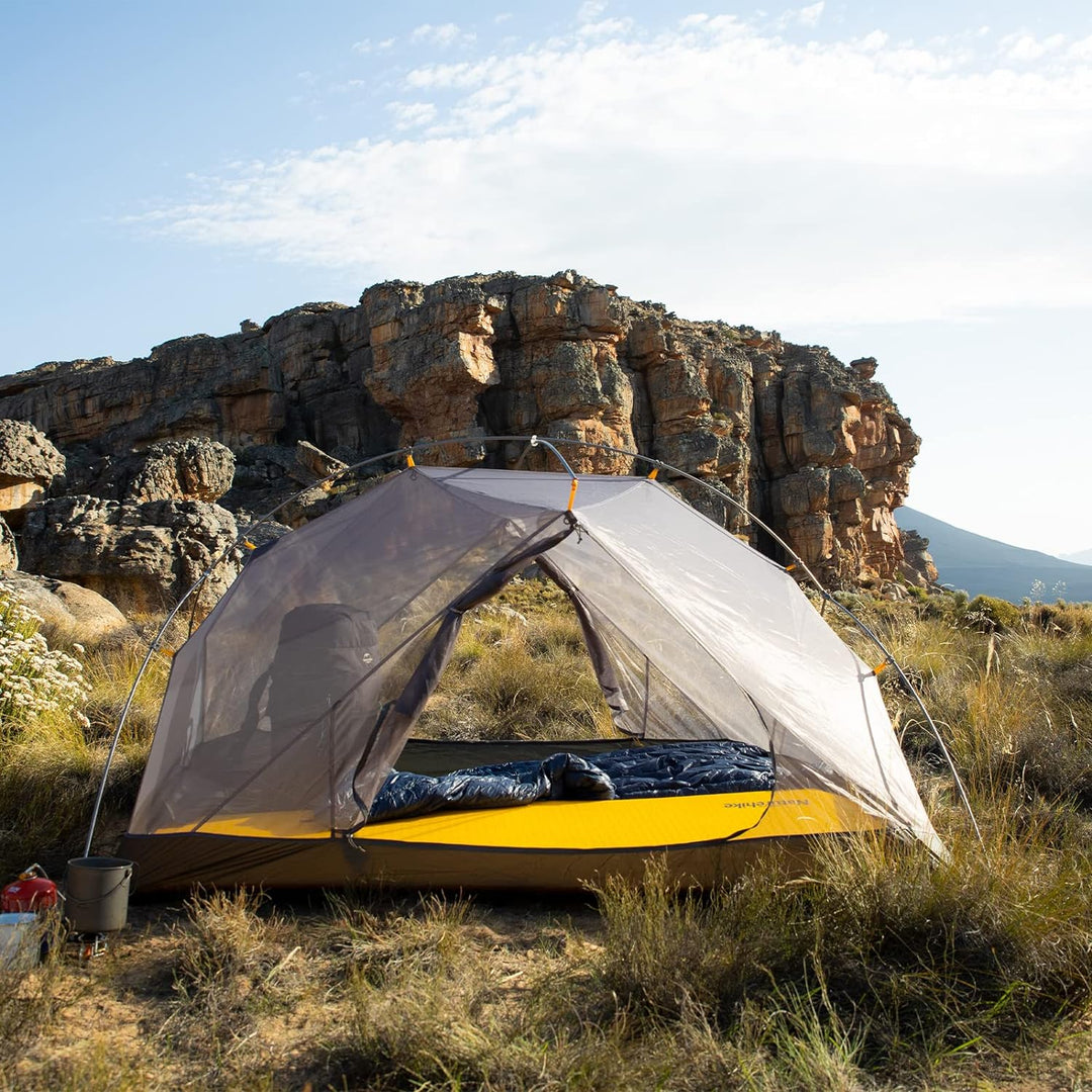 The Mongar Backpacking Tent is a two-person tent with a spacious top design that allows full waist and back extension, making it very comfortable to rest in. This tent is designed with a double Y-shaped structure, which is easy to set up and provides enhanced stability to resist wind.